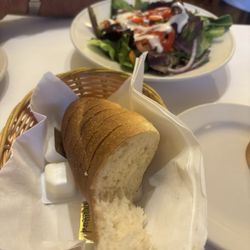 La Rocca's Restaurant & Pizzeria - House salad and the bread that comes with the dinners