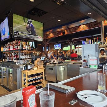 Brick House - View from the outdoor bar looking at Ashlin Great server and bartender five stars - American Near Me - Sugar Land, Texas