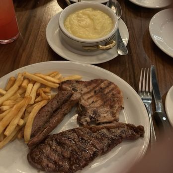 Da Silva Steakhouse - Trio plate. Sausage, steak and pork chop Mashed potatoes and French fries - Steakhouses Near Me - Katy, Texas Da Silva Steakhouse - Trio plate. Sausage, steak and pork chop Mashed potatoes and French fries - Steakhouses Near Me - Katy, Texas