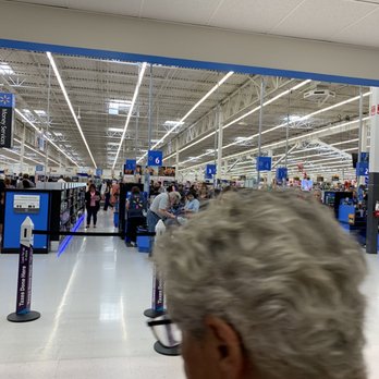 Walmart Supercenter - This is the view of the store from customer services that Natalie doesn't see due to texting - Department Stores Near Me - Chino, California