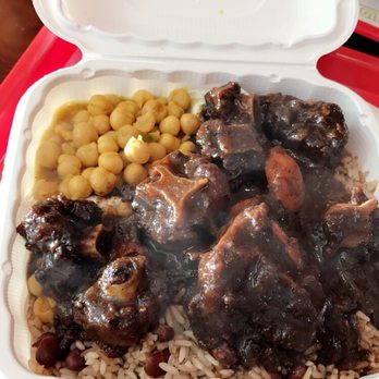SaPoDilla's - Oxtail stew with rice and beans and a side of chick peas. - Caribbean Near Me - Fort Washington, Maryland SaPoDilla's - Oxtail stew with rice and beans and a side of chick peas. - Caribbean Near Me - Fort Washington, Maryland