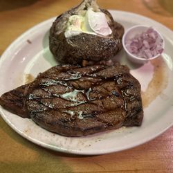 Texas Roadhouse - 12oz. Fort Worth ribeye with baked potato, no chives or green onions, so I asked for red onions on the side