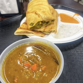 India Sweets & Spices - Masala Dosa: crispy crepe of fermented rice & lentil batter, filled with a spiced potatoes. Served w/ chutneys and sambar (soup). - Indian Near Me - Northridge, California India Sweets & Spices - Masala Dosa: crispy crepe of fermented rice & lentil batter, filled with a spiced potatoes. Served w/ chutneys and sambar (soup). - Indian Near Me - Northridge, California