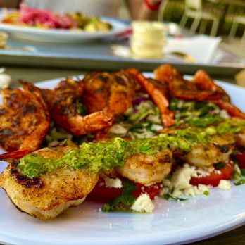 California Fish Grill - GIANT SHRIMP PLATE (w/CAJUN seasoning) over a Kaleslaw and SEASONED TOMATO & FETA and a side of chimichurri Grillled SHRIMP SKEWERS. - Fish & Chips Near Me - Fresno, California California Fish Grill - GIANT SHRIMP PLATE (w/CAJUN seasoning) over a Kaleslaw and SEASONED TOMATO & FETA and a side of chimichurri Grillled SHRIMP SKEWERS. - Fish & Chips Near Me - Fresno, California