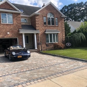 Tarr's Home Improvements - a car parked in front of a house - General Contractors Near Me - Franklin Square, New York Tarr's Home Improvements - a car parked in front of a house - General Contractors Near Me - Franklin Square, New York