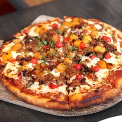 Cilantro on the Lake - Boar Chorizo Pizza ($36) - mushrooms, roasted squash, caramelized onions, sweet drop peppers, mozzarella cheese