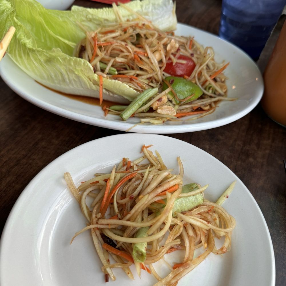 Beyond Thai - Papaya salad.  Darker and a little fishier than I'm used to, but tasted pretty good.  Loved it with sticky rice to dip! - Thai Near Me - Littleton, Colorado