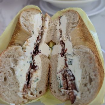 Kneller’s Delicatessen & Appetizing - Plain bagel, scallion cream cheese and added bacon - Delis Near Me - Tucson, Arizona