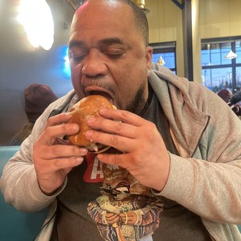 Mellow Mushroom - Midlothian - My Bae eating the monster BYO burger. - Pizza Near Me - Midlothian, Virginia