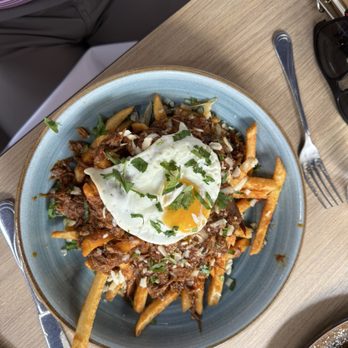 Opa Taverna - Greek potatoes with braised short rib and an egg - Greek Near Me - West Chester, Pennsylvania Opa Taverna - Greek potatoes with braised short rib and an egg - Greek Near Me - West Chester, Pennsylvania