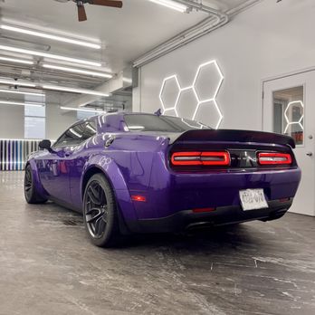 Wrap Estate - Toyota Supra adorned with a glossy red vinyl, enhancing appearance while safeguarding. - Vehicle Wraps Near Me - Wyckoff, New Jersey