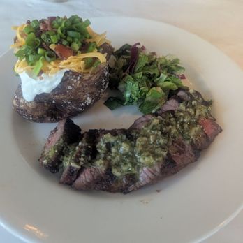 The River House - Steak Fritas with baked potato. - Seafood Near Me - Palm Beach Gardens, Florida The River House - Steak Fritas with baked potato. - Seafood Near Me - Palm Beach Gardens, Florida