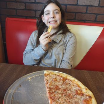 Richie B’s Pizza - She ate the entire thing minus a couple crusts. - Pizza Near Me - Albuquerque, New Mexico
