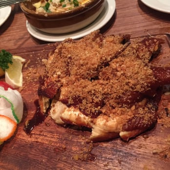 華星客棧 - Their signature crispy chicken.  It's topped with fried garlic. - Hong Kong Style Cafe Near Me - Hong Kong, HK