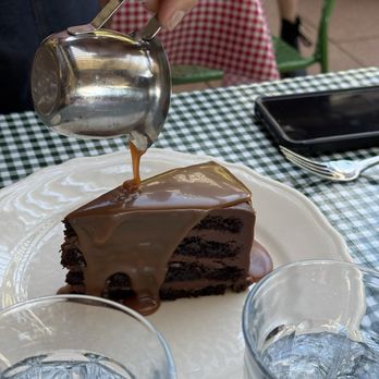 The Pink Door - Chocolate cake with caramel sauce - Italian Near Me - Seattle, Washington The Pink Door - Chocolate cake with caramel sauce - Italian Near Me - Seattle, Washington