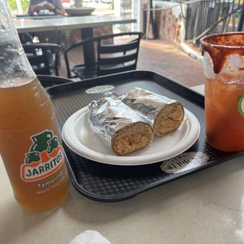 Flor’s Farm To Table - Salmon Burrito. Not the traditional burrito, however so good! Add a Michelada or Jarrito and you're all set. - New Mexican Cuisine Near Me - San Diego, California Flor’s Farm To Table - Salmon Burrito. Not the traditional burrito, however so good! Add a Michelada or Jarrito and you're all set. - New Mexican Cuisine Near Me - San Diego, California