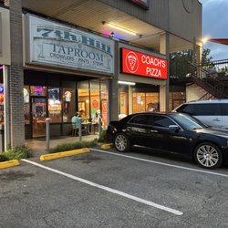 Coach's Pizza - Exterior view of entrance.