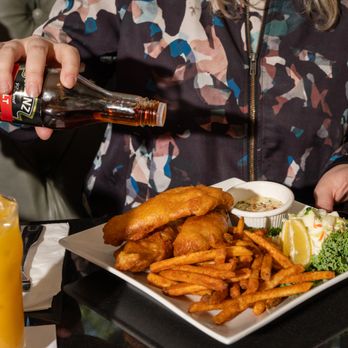 Molly Os - Crispy, golden Fish & Chips - a classic favorite that never disappoints! - Irish Pub Near Me - San Carlos, California Molly Os - Crispy, golden Fish & Chips - a classic favorite that never disappoints! - Irish Pub Near Me - San Carlos, California