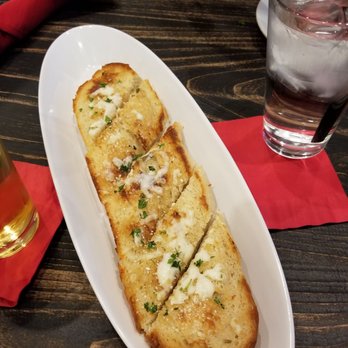 Pizza Rock - Garlic Garlic Bread... so delish, they had to throw 2 garlic in the name. Let the feasting begin.... - Pizza Near Me - Henderson, Nevada Pizza Rock - Garlic Garlic Bread... so delish, they had to throw 2 garlic in the name. Let the feasting begin.... - Pizza Near Me - Henderson, Nevada