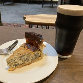 The Monroe - Mushroom/ cheddar quiche and an amazing pour of Guinness. I am a nerd for Guinness and this was great! - Themed Cafes Near Me - New York, New York