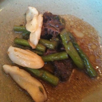 Nishino - Sauteed squid with morel mushrooms and asparagus. - Sushi Bars Near Me - Seattle, Washington Nishino - Sauteed squid with morel mushrooms and asparagus. - Sushi Bars Near Me - Seattle, Washington