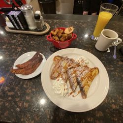 Eggnog French toast, side of bacon and home fries