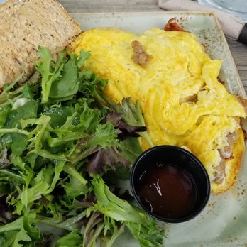 First Watch - Italian sausage omelette with fresh greens and yummy toast - Breakfast & Brunch Near Me - Mount Pleasant, South Carolina First Watch - Italian sausage omelette with fresh greens and yummy toast - Breakfast & Brunch Near Me - Mount Pleasant, South Carolina