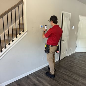 LunsPro Inspection Group - Licensed and Certified Inspector checking the thermostat panel at an inspection. - Home Inspectors Near Me - Raleigh, North Carolina LunsPro Inspection Group - Licensed and Certified Inspector checking the thermostat panel at an inspection. - Home Inspectors Near Me - Raleigh, North Carolina