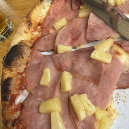 Hawaiian pizza. Big enough to share. Loved the crust. Hawaiian pizza. Big enough to share. Loved the crust.