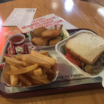 Faidley’s Seafood - Fried shrimp, fries and fried soft crab sandwich - Seafood Markets Near Me - Baltimore, Maryland