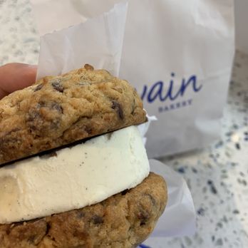 Levain Bakery - Upper East Side, NYC - Chocolate chip walnut cookies ice cream sandwich. - Bakeries Near Me - New York, New York
