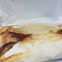 Deli Central - Tasty toasted wrap with chicken, cheese, sweet chilli sauce and red onions