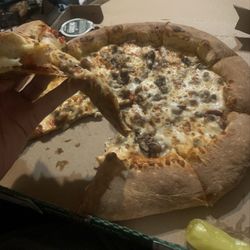 Epic Stuffed Crust Pizza with sausage and mushrooms