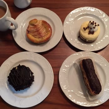 1886 Cafe & Bakery - Why try just one?  Eclair, chocolate cake, banana pudding and Apple tart. - American Near Me - Austin, Texas