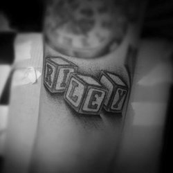 Slick Styled Steel (Le) - Tattoo by Alex