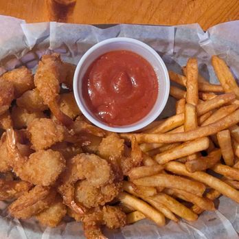 Shively's Bar & Grill - Fried shrimp basket with awesome spicy cocktail sauce - Burgers Near Me - Oakdale, California Shively's Bar & Grill - Fried shrimp basket with awesome spicy cocktail sauce - Burgers Near Me - Oakdale, California