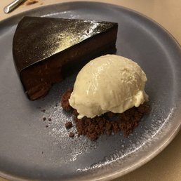 chocolate cake - hazelnut & chocolate tart w/ vanilla ice cream... reminds me of ferrero rocher...