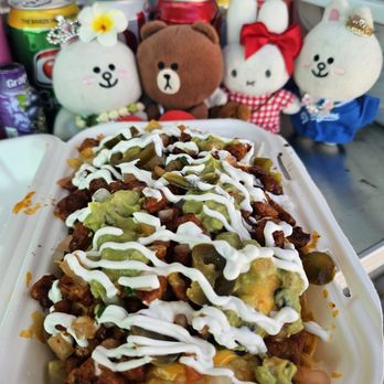 Tacos Zapata - Nachos... $10.99, plus tax on Fridays (meat add-on is free) - Tacos Near Me - Urban Honolulu, Hawaii