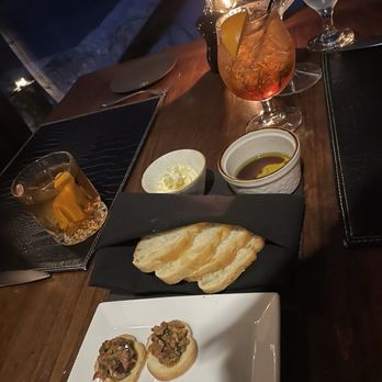 The Narrows At Shore Lodge - Bread and nightly pairing of crostini with olive tapenade. - New American Near Me - Mccall, Idaho The Narrows At Shore Lodge - Bread and nightly pairing of crostini with olive tapenade. - New American Near Me - Mccall, Idaho