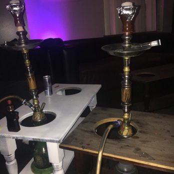 Ramsey's Hookah Lounge - a hookah on a table - Hookah Bars Near Me - Buffalo, New York