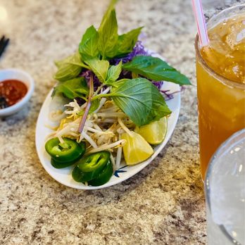 Pho Dan - a plate of food and a drink - Vietnamese Near Me - Round Rock, Texas