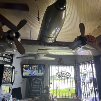 Airport Hanger Bar - a plane suspended from the ceiling - Bars Near Me - Sanford, Florida