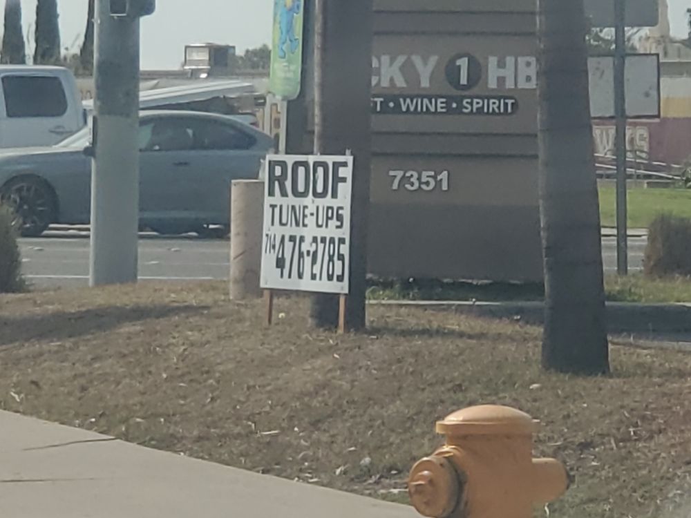 Slide of Mikes Roofing