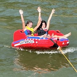 Houseboats.com - Having fun tubing!