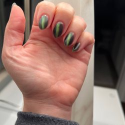 Green cat eye with a rounded point done by Tiny!