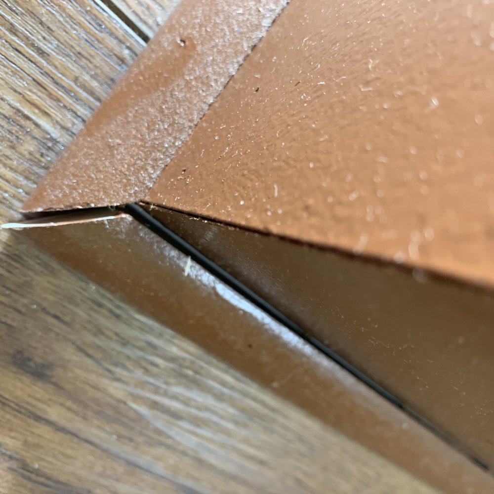 Castleberrys Carpentry - Floor trim not anchored properly - Carpenters Near Me - Seattle, Washington
