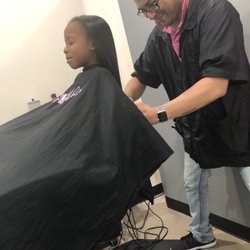 Jenny's Salon & Spa - Tino does my daughters hair as well. Silk press with clipped ends !