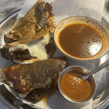 Belly Of The Beast - Birria queso tacos - Desserts Near Me - Spring, Texas Belly Of The Beast - Birria queso tacos - Desserts Near Me - Spring, Texas