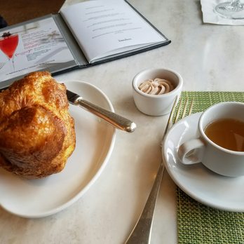 Mariposa - Chicken consommé and popover with strawberry butter - New American Near Me - Honolulu, Hawaii