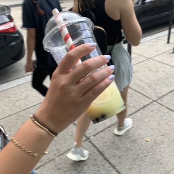 Tea Mansion - Many bubble tea with milk and a paper straw that didn't reach the bottom - Tea Rooms Near Me - Washington, DC, District of Columbia